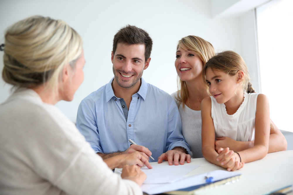 Family Signing papers