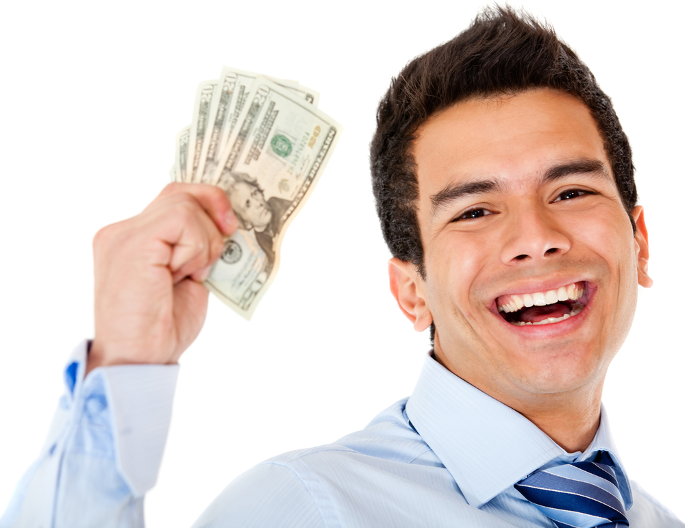 Successful businessman holding dollars - isolated over a white background