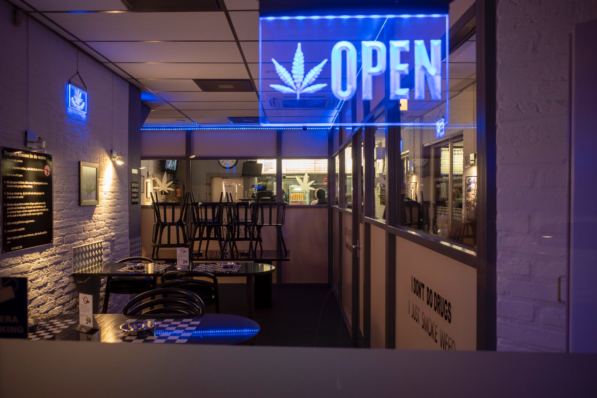 Cannabis cafe that has a sign of open for business